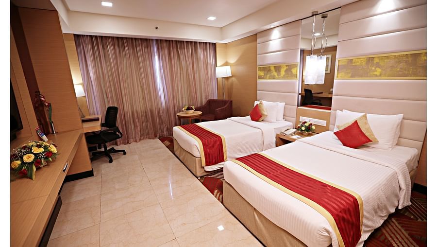 twin bedding offered at Premium Room in Vizag 2