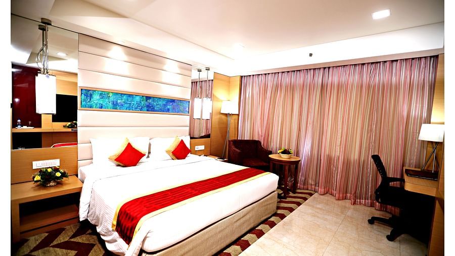 a king size bed offered at Premium Room in Vizag