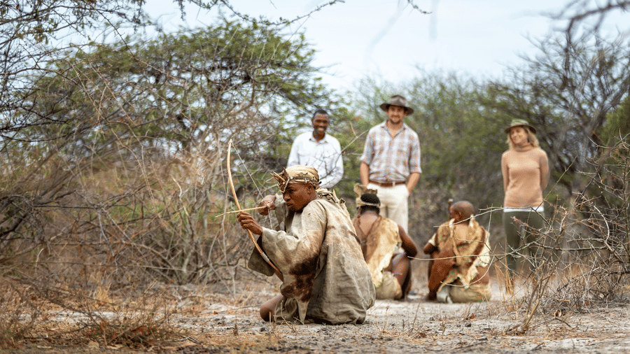 Guests learning bushcraft and animal tracking in the Kalahari at Evolve Back resort