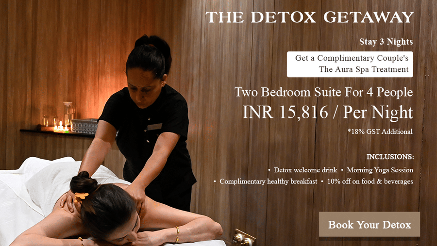 Creative featuring a woman giving back massage to the guest in The Manor Sports and Wellness Hotel. It is a promotion for 3 nights stay in a two bedroom luxury suite  for 4 people at INR 15,816.
