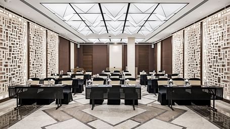 Meeting room featuring contemporary decor and comfortable black chairs at Radisson BLU.