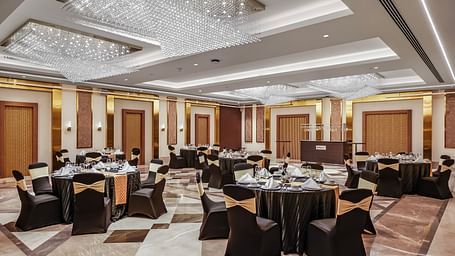 DIning hall with banquet setup and contemporary decor at Radisson BLU