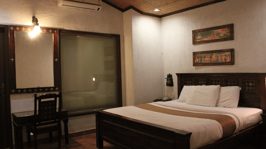 The bed offered by the Suite at The Adamo Village