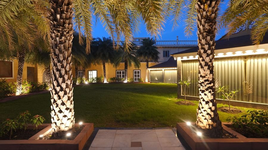 View of the garden from two tree steams of Rajbageecha, our in-house garden banquet at The Garden Ananta Elite, Rajkot 7