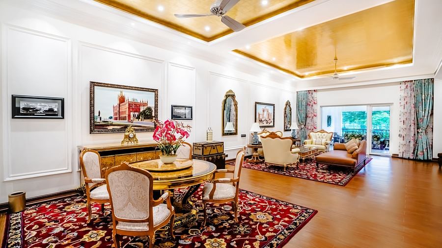 a sofa set and a dining table in the living room - Mayfair Tea Resort, Siliguri 