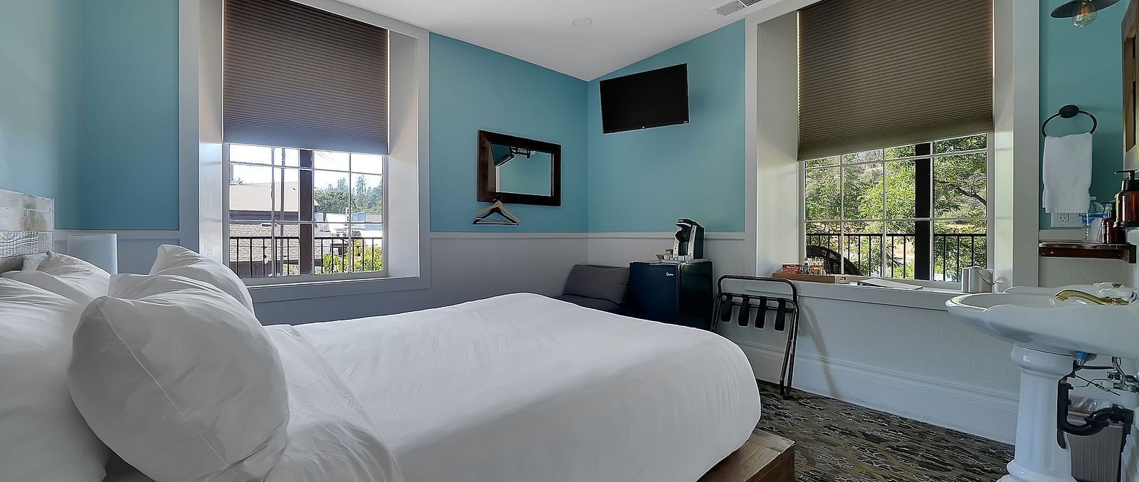 A view of a room at The Groveland Hotel with a double bed.