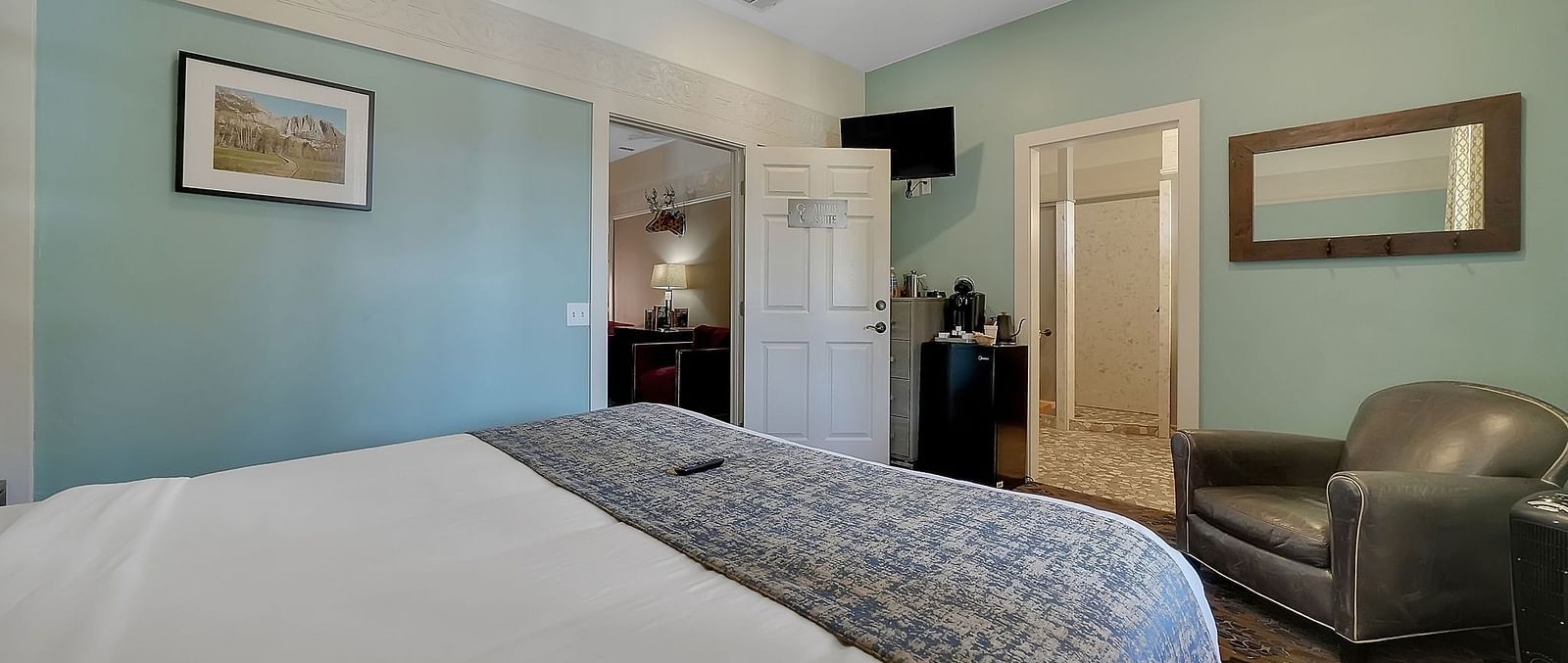 A view of a room at The Groveland Hotel with a double bed.