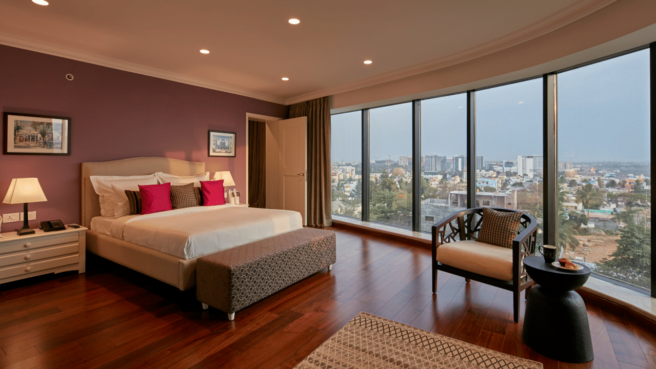 comfy bedroom offering beautiful views of the surroundings