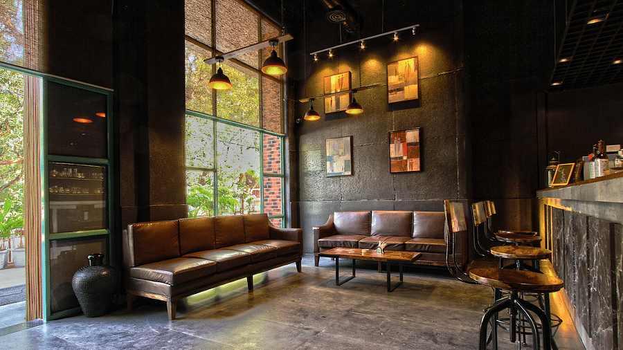 sofas at the restaurant at Rosetum Anjuna