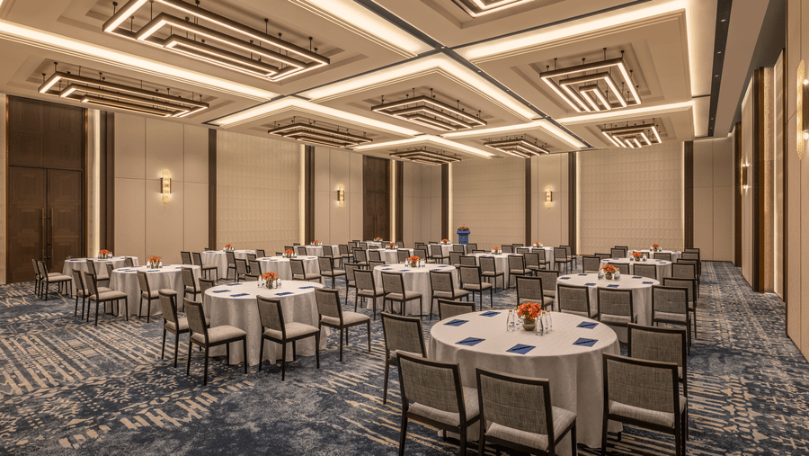 Executive Lounge set up with round tables for a dining event at The Residency Signature Madurai.
