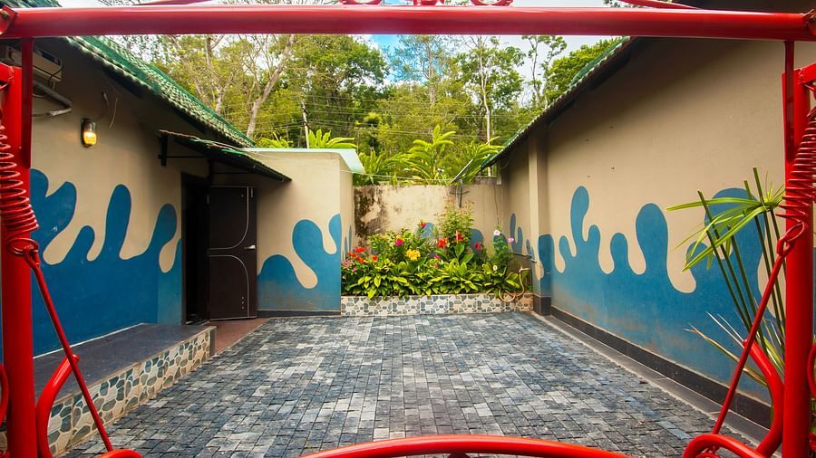 Image of kids play area with plants in the background at Coorg Jungle Camp Backwater Resort, Kushalnagar.
