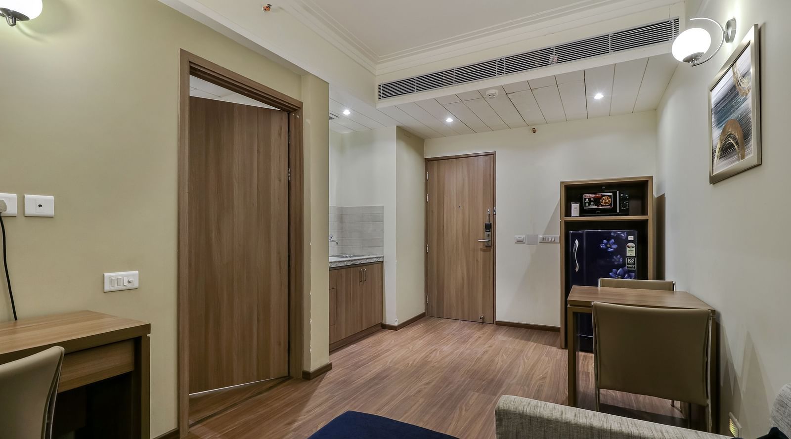 Living area in view inside Deluxe Suite - Starlit Suites Newtown, Kolkata