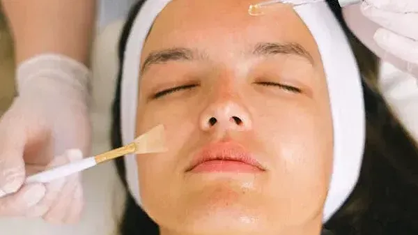 a facial treatment being done