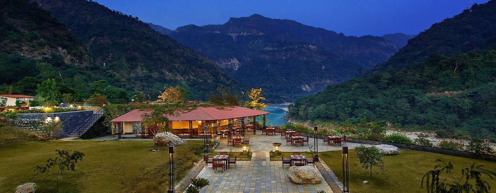 Outdoor restaurant with a view of the mountains.