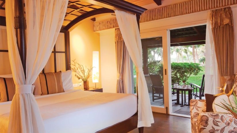 interior of a bedroom at The Serai Kabini-19
