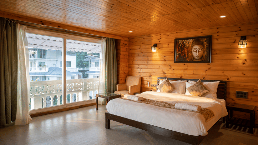 The Premium Cottage offers a large balcony with a great view - Stone Wood Riverfront Resort, Siolim