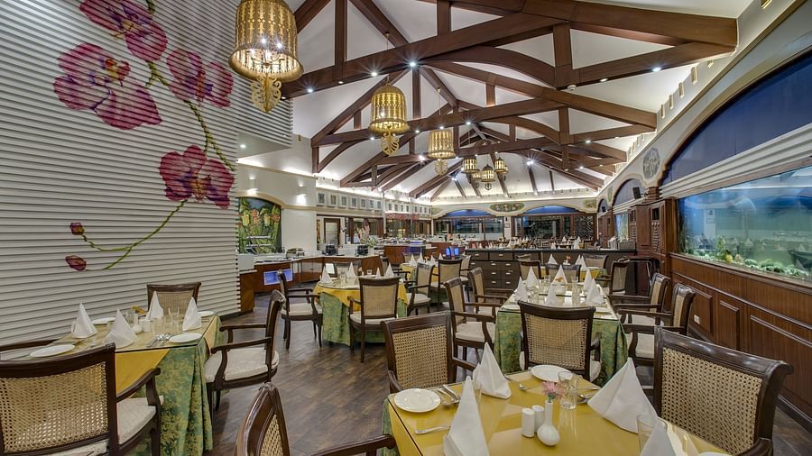indoor dining seating space - Mayfair Spa Resort & Casino Gangtok
