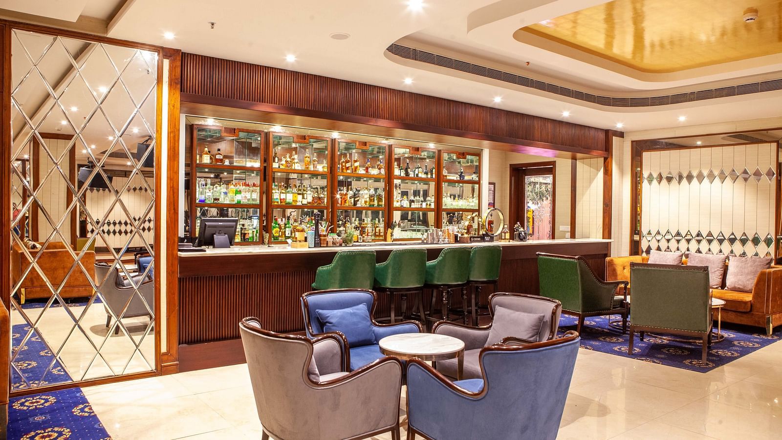 indoor seating space at the bar - Mayfair Lake Resort, Raipur 