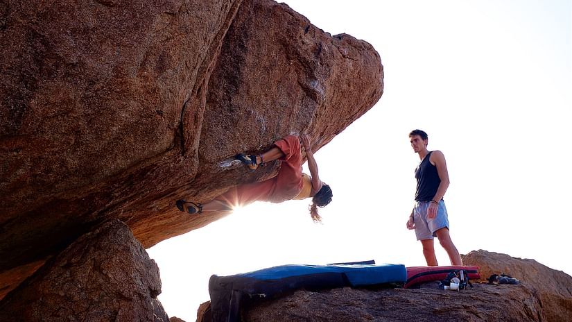 two people enjoying rock climbing adventure sports