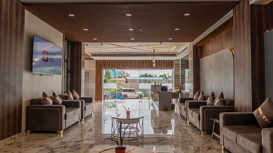 Inside view of the lobby with comfy sofa and reception area at Mastiff Select Medha Plaza, Deoghar