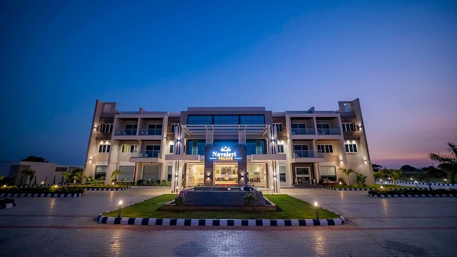 A wide-angle shot of the facade of Hotel Kyriad Prestige, Ilkal at night