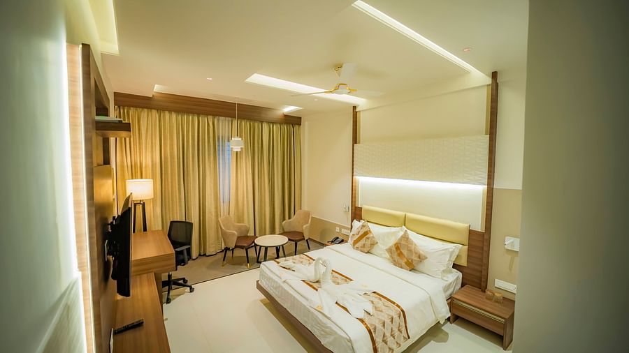 A full view of double Bed in the Executive Room With Breakfast at Kyriad Prestige, Ilkal