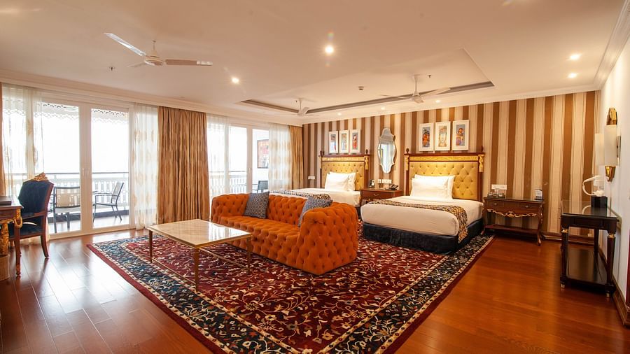 view of a king size bed and a seating space - Mayfair Lake Resort, Raipur 3