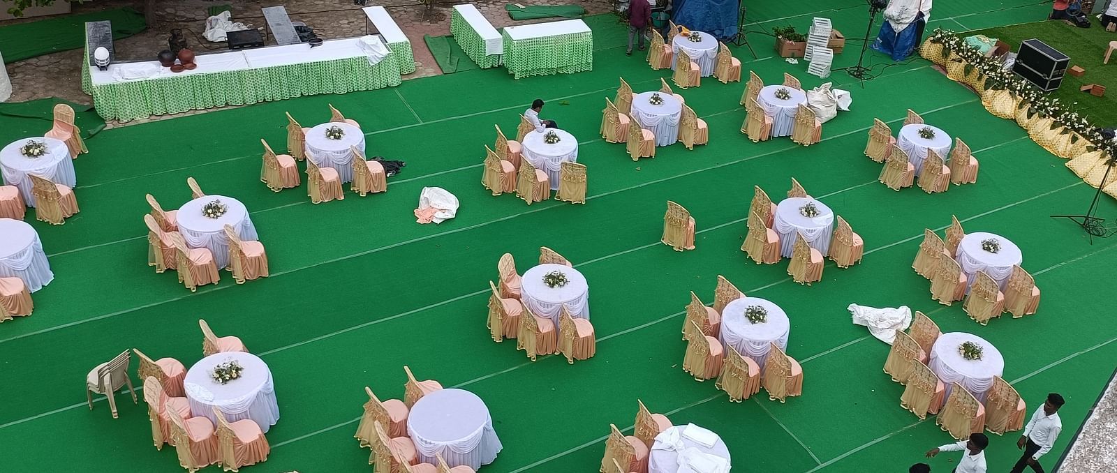 An aerial shot of our Starlight Garden venue in Tuticorin, featuring round tables with chairs placed around them - Regency Tuticorin by GRT Hotels