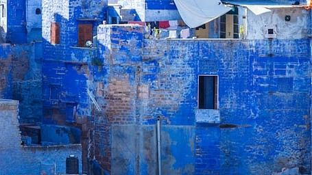 An image of blue buildings during the day
