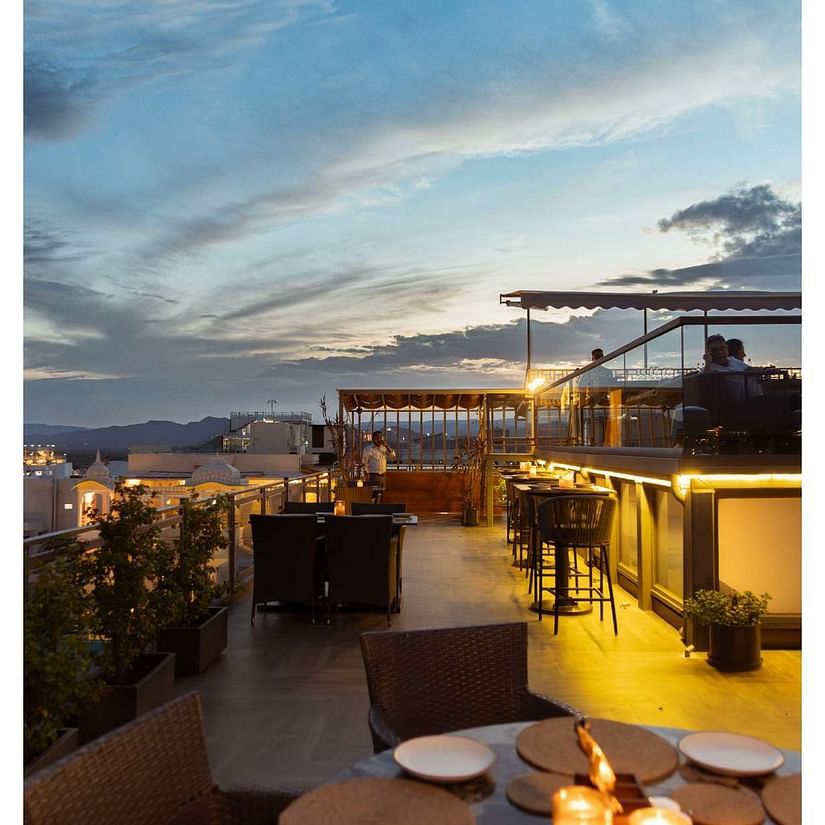 dining rooftop arrangement at sunset