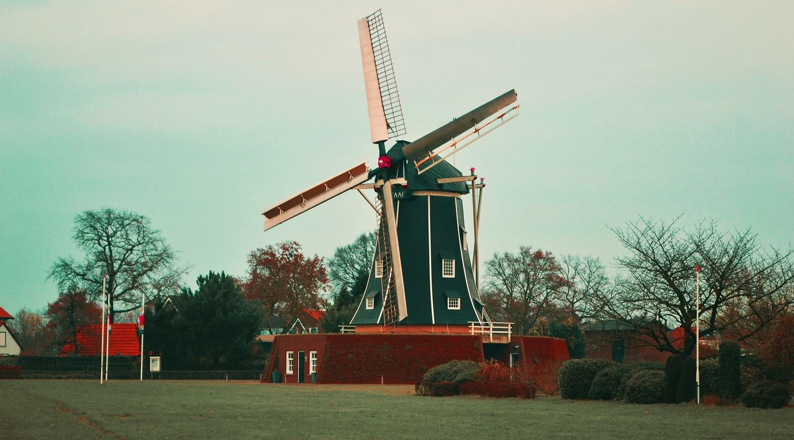  An image of the windmill among the forest area.
