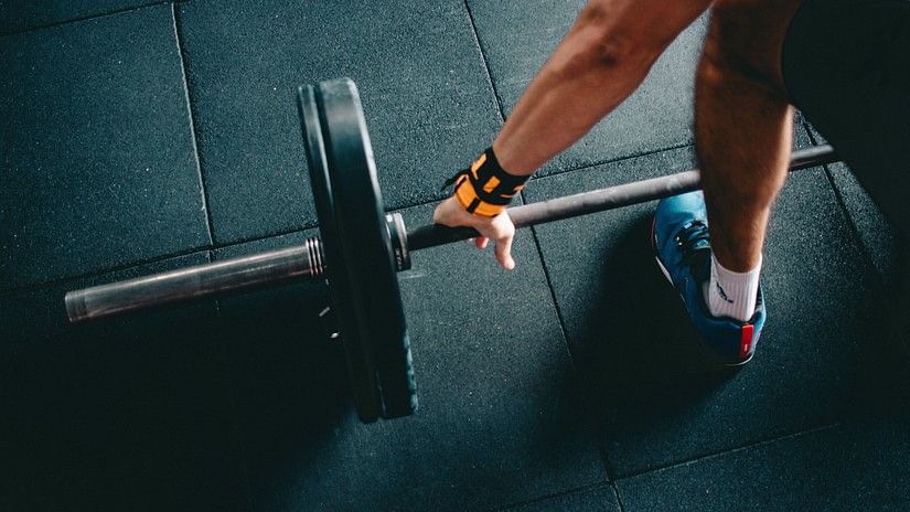 a close up shot of a Person working out in the gym