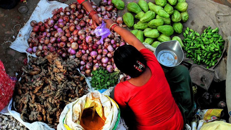 A women selling vegetables at a shop