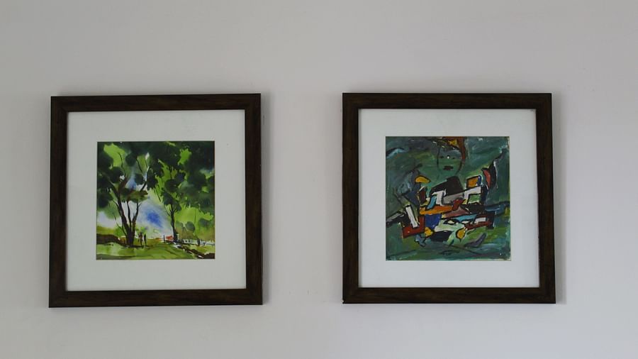A zoom shot of two frames on the wall of a living room in the apartment