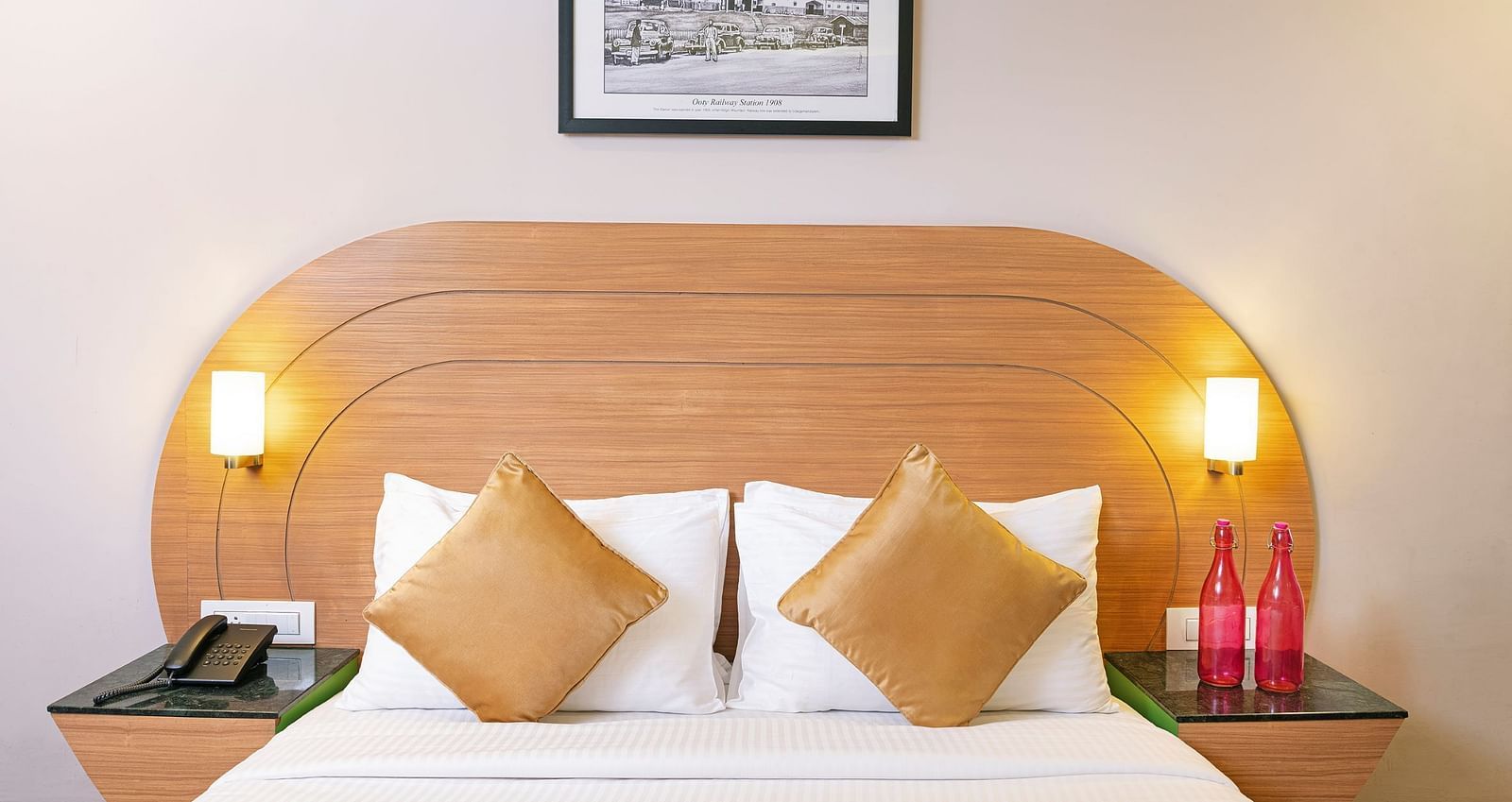 An image of a double sized bed | Mango HIll Central, Ooty