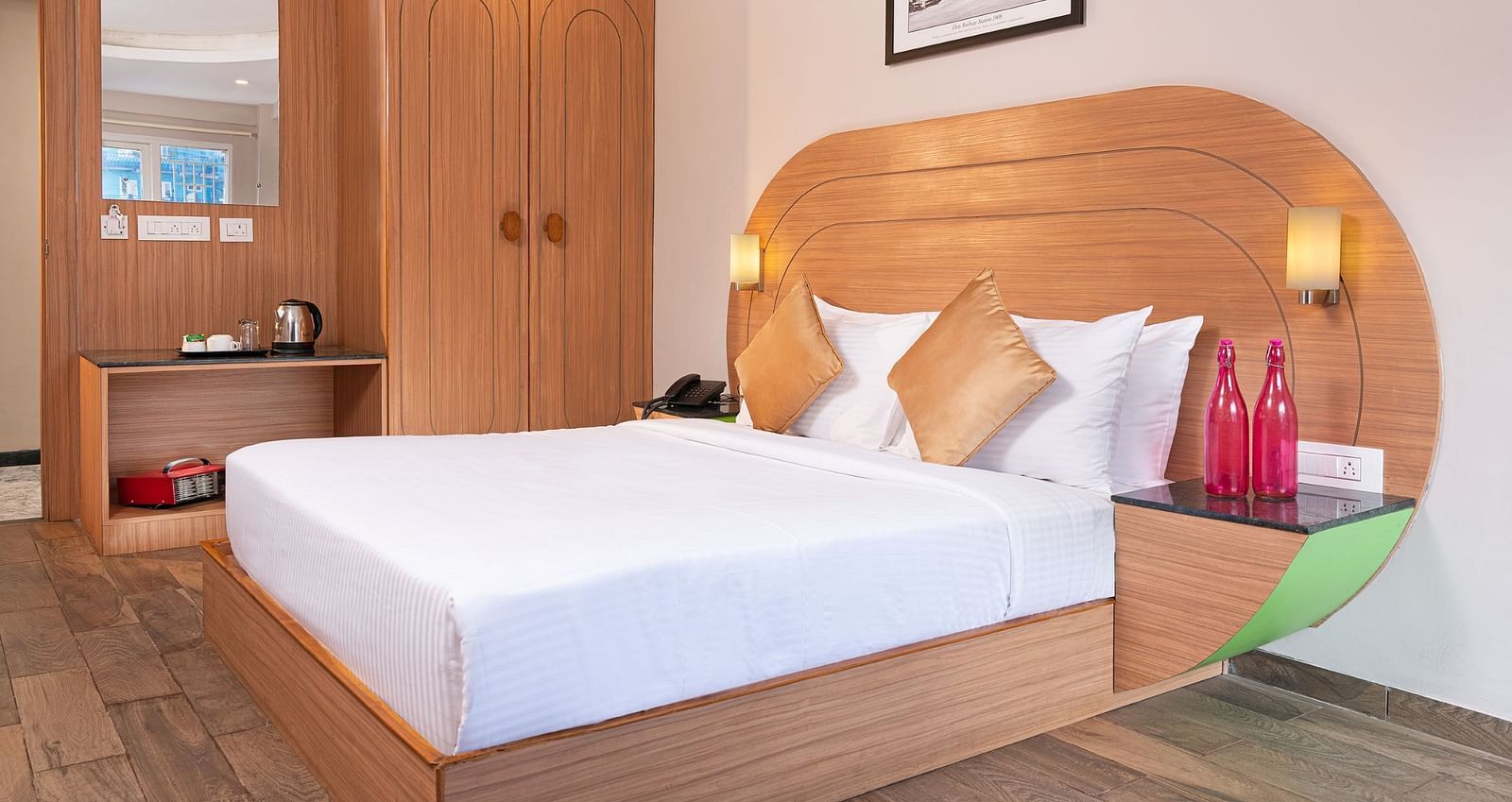 An image of a well furnished bedrooom  | Mango HIll Central, Ooty