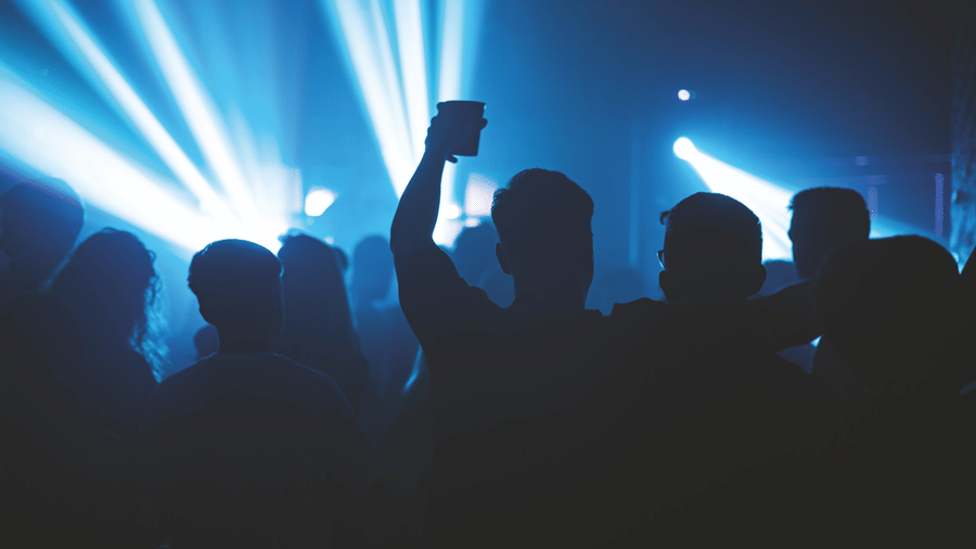 people dancing at an event in goa