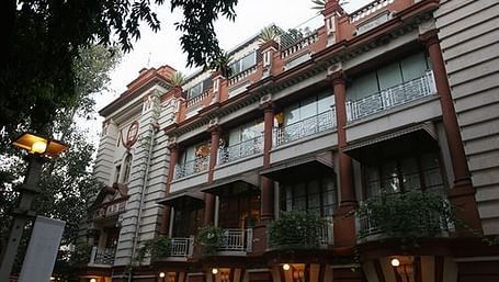 A facade image of The House of MG