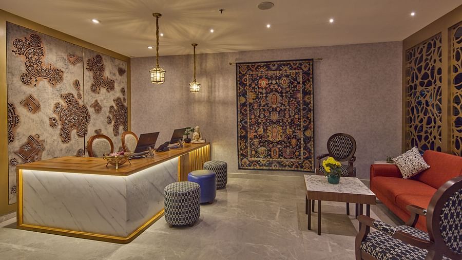 the front desk and sitting space at the reception - Golden Tulip, Tirupati  