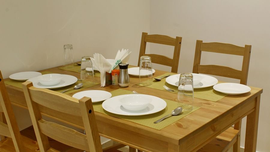 View of Dining Table with multiple chairs and plates - Maxxvalue Apartment Hiranandani, Powai