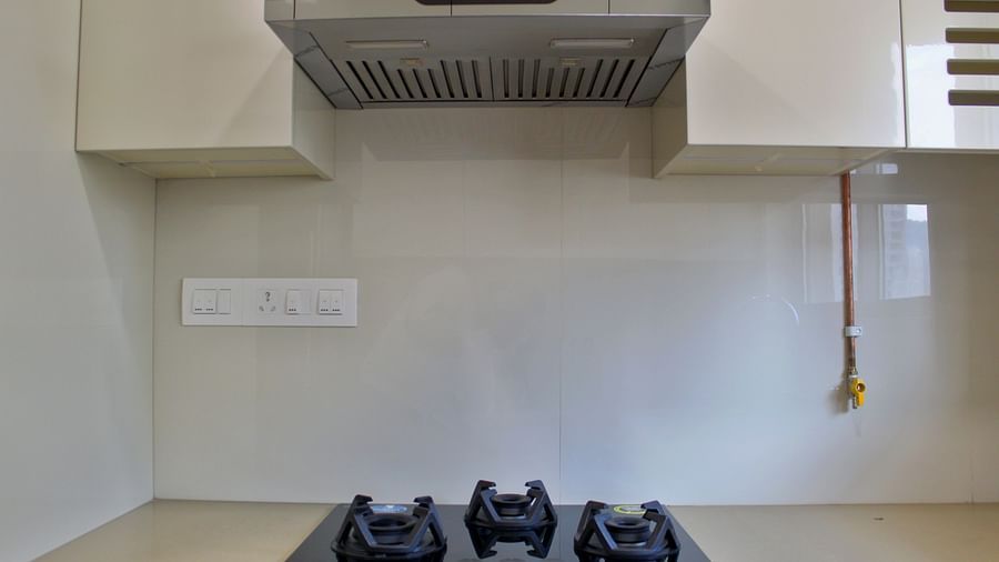 Front view of kitchen with basic amenities - Maxxvalue Apartment, Hiranandani, Powai