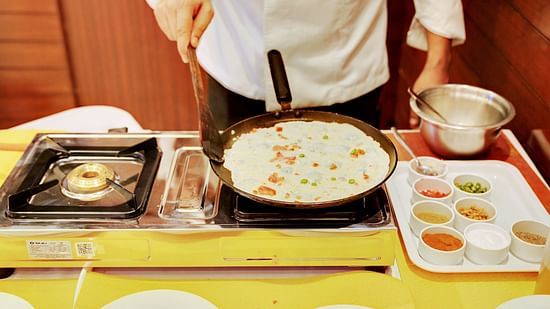 the chef preparing a dish