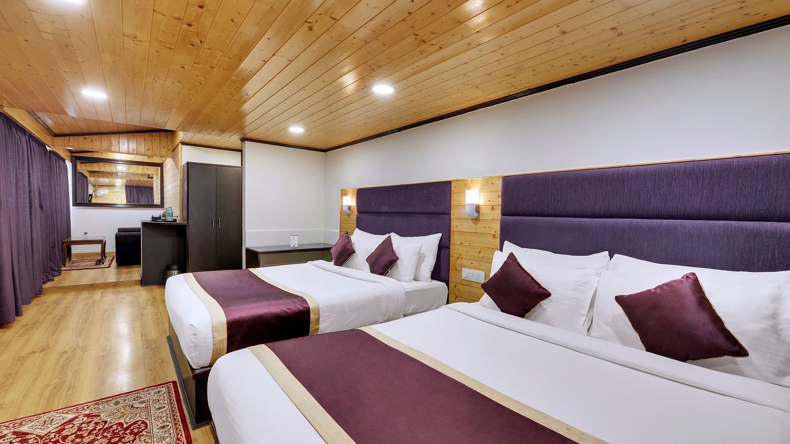 Deluxe Triple Room at Sumitel Darjeeling. A room with three beds, perfect for families or groups of friends.