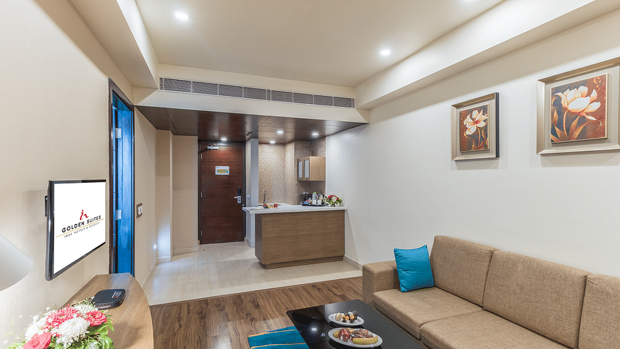 Suite Living room with comfy sofa at Golden Suites