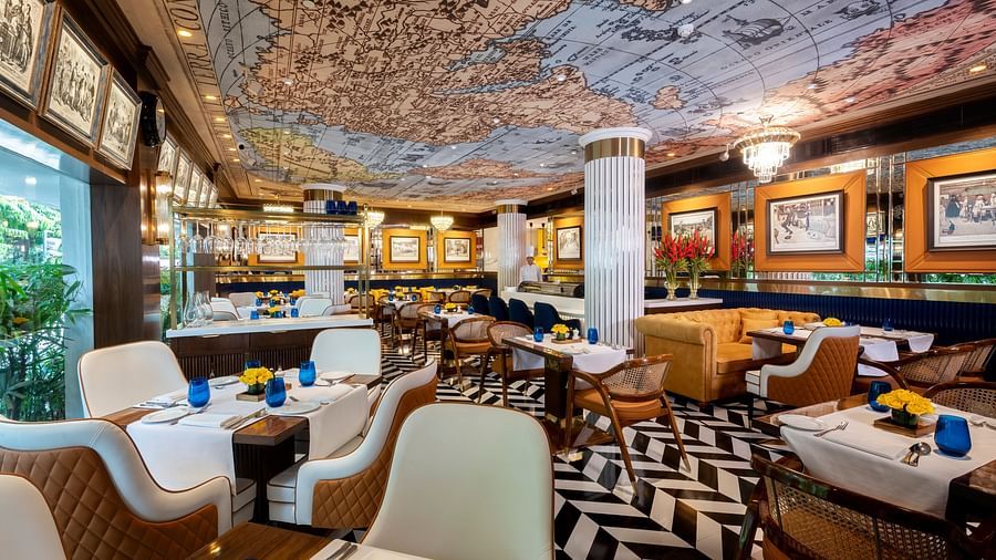 Image of Pickwick Bar with seating area at The Claridges New Delhi