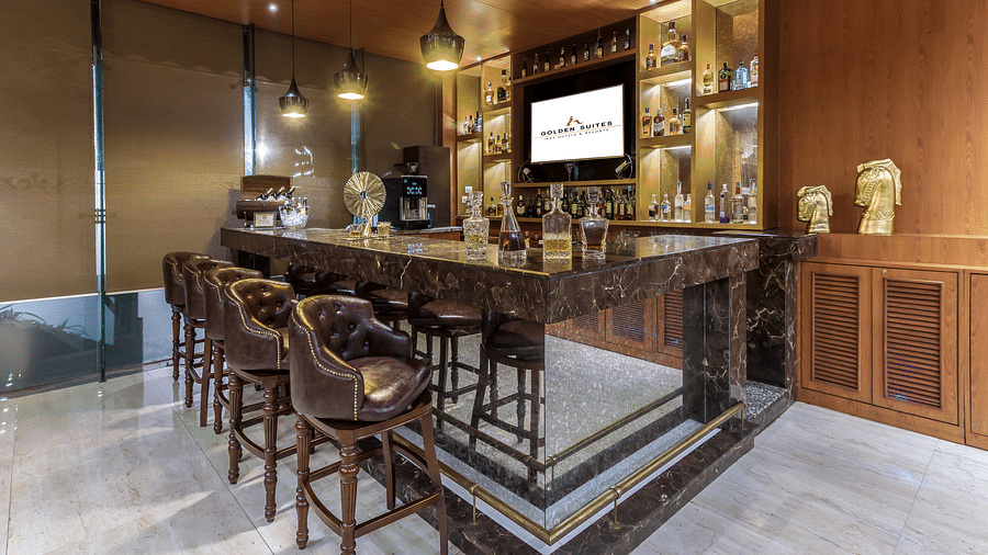 A side angle view of the the bar at Golden Suite