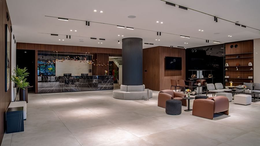 A hotel lobby with stylish seating areas and modern decor. - The Pelican Hotel, Accra