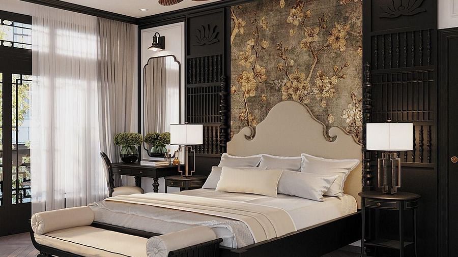A spacious room with a diagonal view of the large bed, and a large window to the side at The Evren, Vagator.