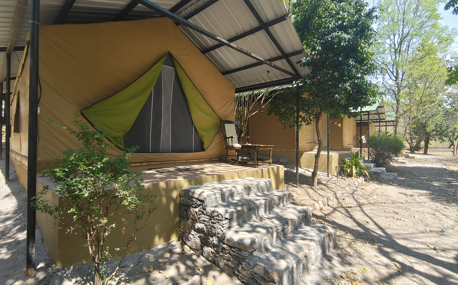 facade of a tent surrounded by trees - The Jamoon, Corbett