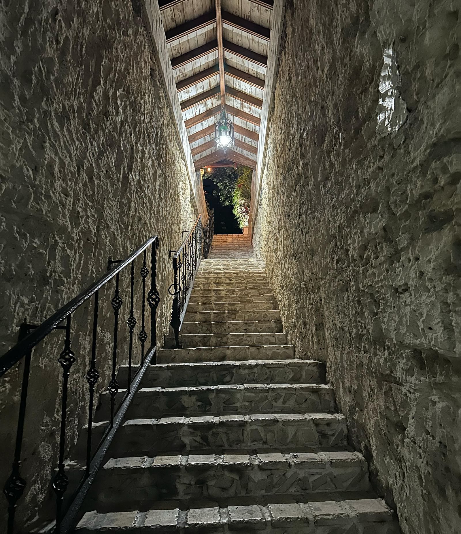 A low angle of a narrow stone staircase